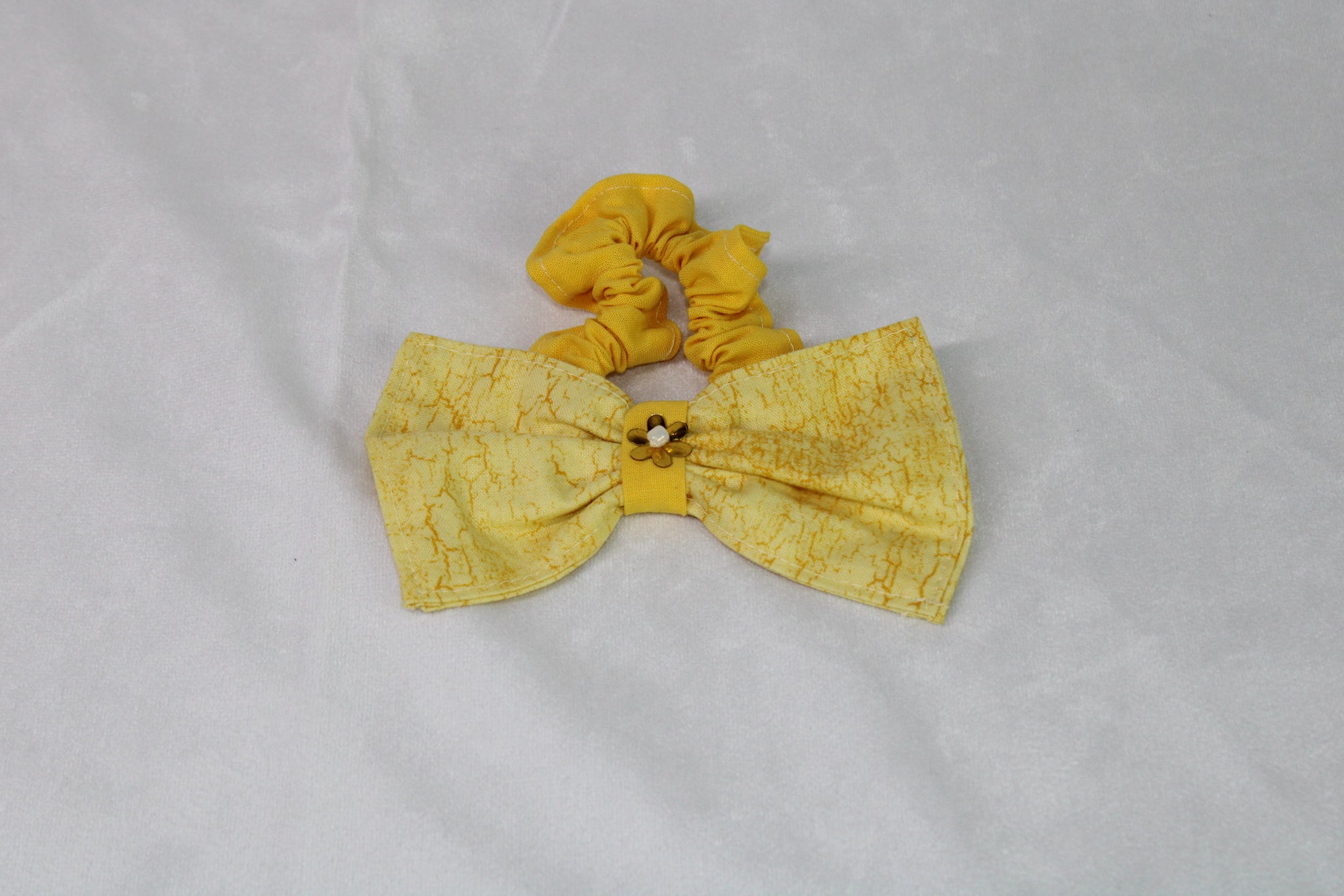 Yellow bow scrunchie