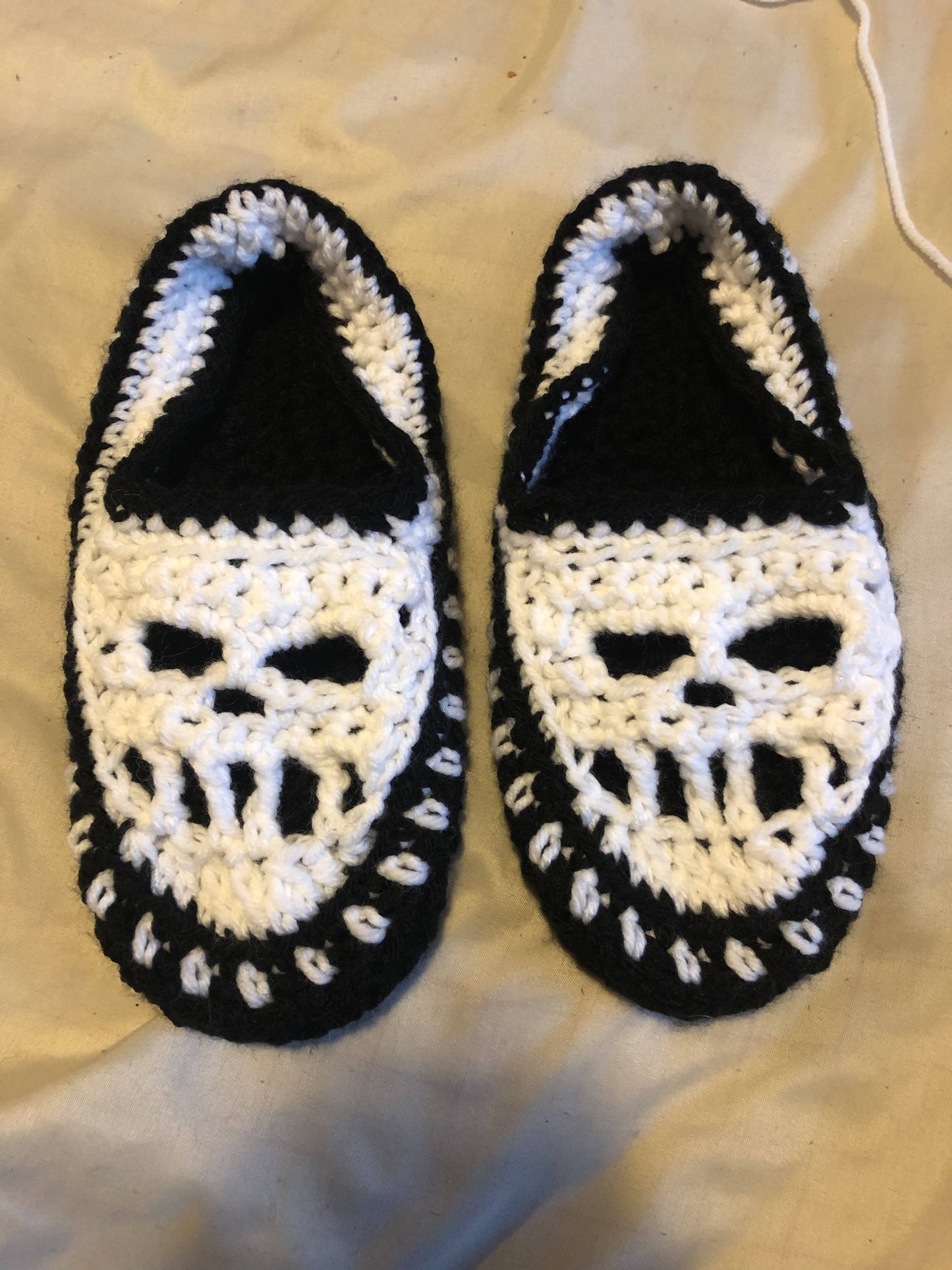 Crochet skull slippers